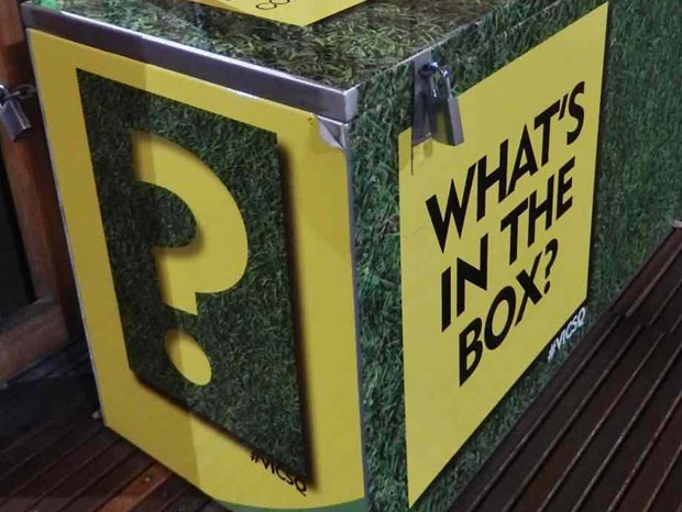 A box with a question mark and the text "What's in the box" on the side